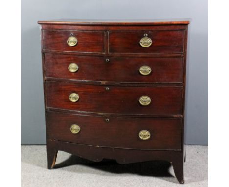 A late Georgian mahogany bow front chest with rounded edge to top, fitted two short and three long drawers, with shaped apron