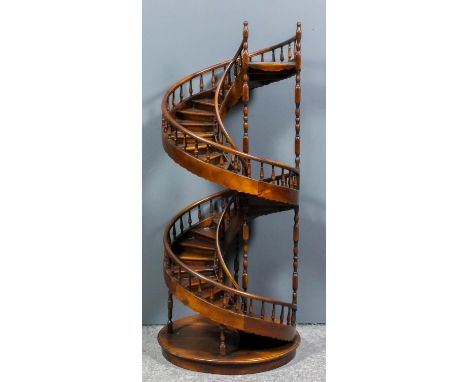 A modern mahogany architectural model of a spiral staircase of early 19th Century design, 16ins diameter x 41.75ins high