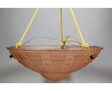 A pink tinted and frosted glass circular ceiling light moulded with boss and reeded ornament, 15.5ins diameter x 5ins high, (