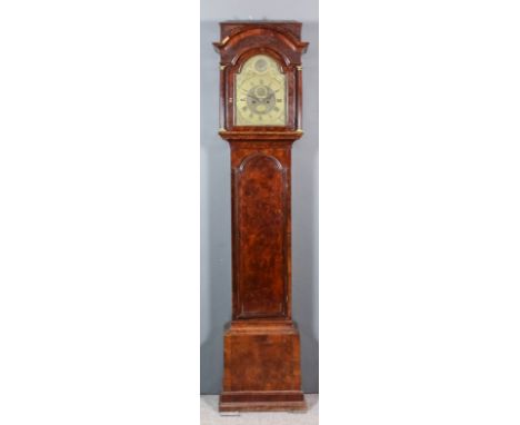 An early 18th Century walnut longcase clock by Nathaniel Tilly of London, the 12ins arched brass dial with wide chapter ring 