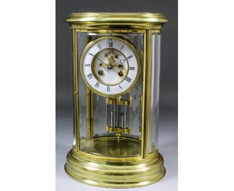 A late 19th Century French oval "Four Glass" mantel clock, No.144 64, the 4.5ins diameter white enamel chapter ring with Roma