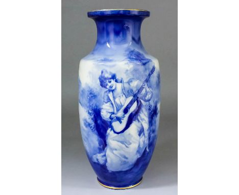 A Royal Doulton pottery "Blue Children" baluster shaped vase transfer printed in blue with a young lady playing a guitar with