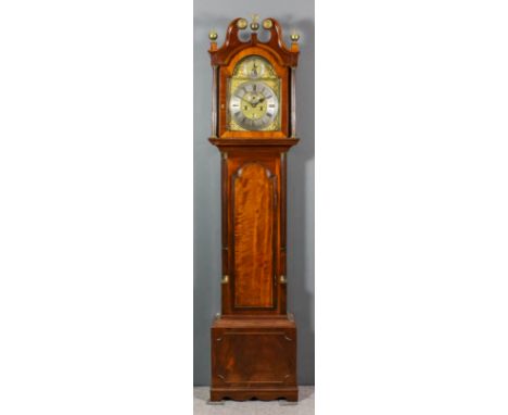 An 18th Century mahogany longcase clock by Robert Jones of Chester, the 12ins arched brass dial with wide silvered chapter ri