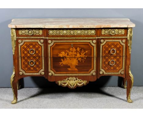 A 20th Century French walnut, marquetry and gilt brass mounted commode of Louis XVI design, the whole of break-front form, th