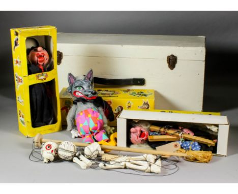 A Pelham puppet - "Skeleton" and original brown card box, three other Pelham puppets - "Wolf" and two "Witches" (boxed), and 