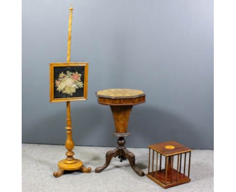 A Victorian walnut octagonal worktable, the top inlaid with chessboard and with moulded edge, opening to reveal fitted interi