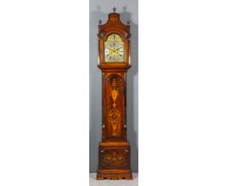 An inlaid mahogany longcase clock by Joseph Heckstetter of London, the 12ins arched brass dial with wide silvered chapter rin