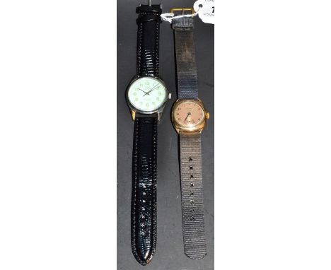 Resolute - a vintage gentleman's wrist watch, circular two tone dial, Arabic numerals, minute track, subsidiary seconds, gold