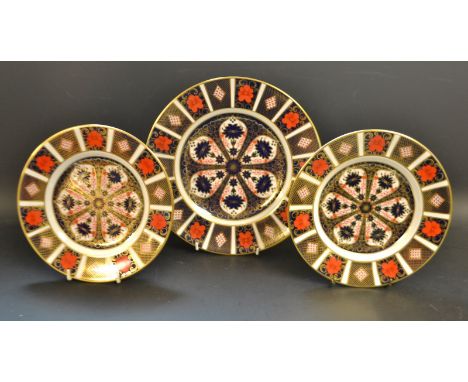 Royal Crown Derby - an 1128 Imari plate;  a conforming smaller pair ( all seconds ) (3)