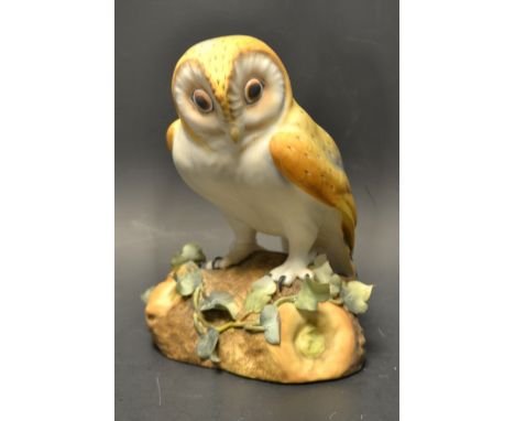 A Royal Crown Derby barn owl model, hand painted with hand applied ivy leaves, seconds.