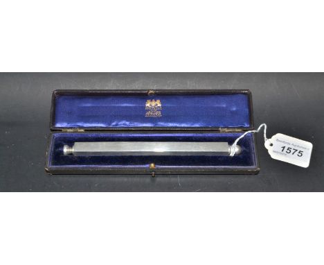 An Edwardian silver novelty travelling writing companion, comprising a pen, propelling pencil and desk seal, each contained w