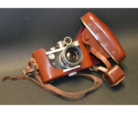 A Corfield Periflex I 35mm camera, Lumax f1.9 45mm lens, leather case; Eumig viewfinder.