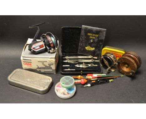 Fishing Tackle - a vintage  brass mounted wooden reel;  others, a Shakespeare's Omni 030, boxed;  floats, weights, etc qty 