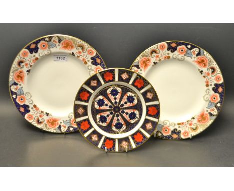 A Royal Crown Derby 1128 pattern dessert plate, first quality; a pair of Imperial Palace pattern dinner plates, seconds (3)