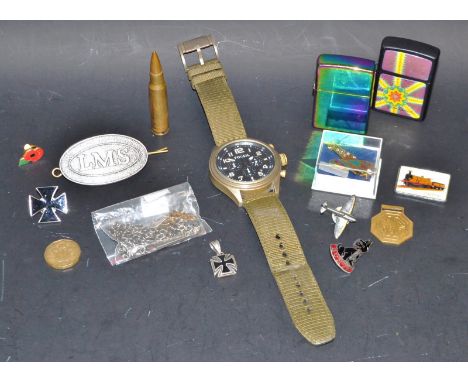 A titanium and diamond dog tag pendant necklace;  a 9ct gold earring, a Fossil wrist watch;  Zippo lighter etc qty