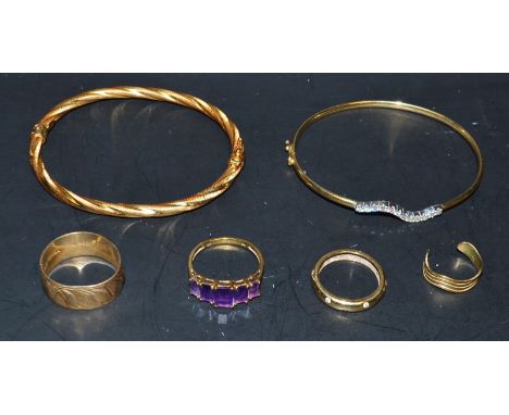 A 9ct gold cubic zirconia hinge bangle;  another rope twist;  a 9ct gold wedding band;  dress rings etc 20.7g gross