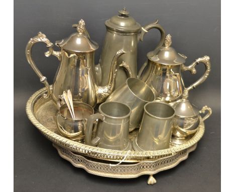 A pair of silver tea spoons, Birmingham; a plated four piece tea service on a tray; pewter ware; etc 