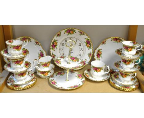 A Royal Albert Old Country Roses pattern table service, including two tier cake stand, two bread plates, cups, saucers, side 