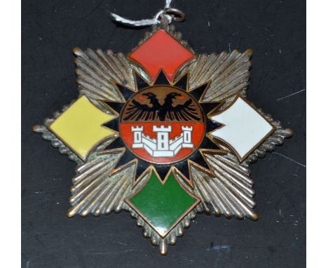 A large German enamel medallion, inscribed Grosse Duisburger Karneval Gesellschaft