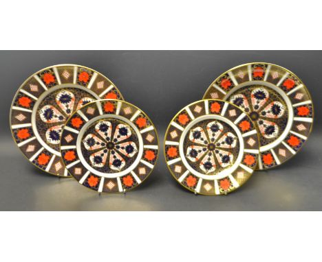 A pair of Royal Crown Derby 1128 Imari plates; another pair, smaller, printed marks (4)