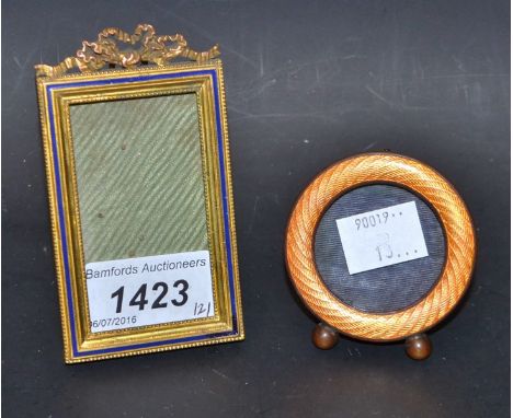 Two gilt and enamel photograph frames