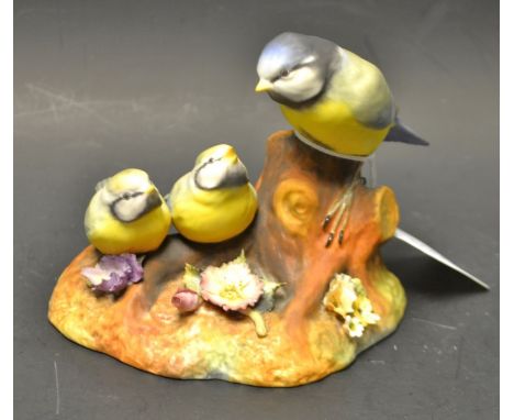 A Royal Crown Derby Blue tits and chicks model, hand painted with hand applied flowers to base, signed