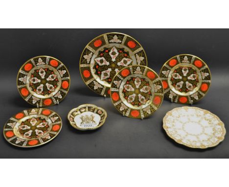 An Abbeydale Chrysanthemum pattern dessert plate; side plates conforming (4); a Royal Crown Derby Derby City Status/Silver Ju