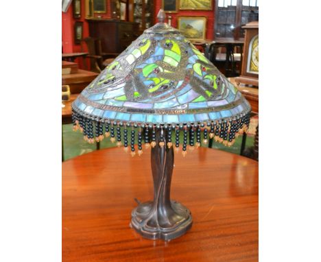 A Tiffany style table lamp,dragonflies and beaded design