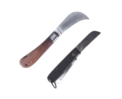 A WWII Second World War British Army issue jack knife along with another folding lock knife with curved blade. The jack knife