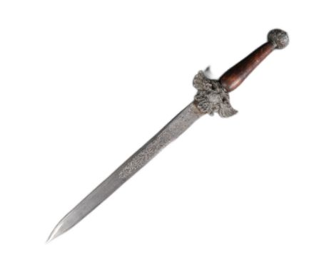 A 19th Century Spanish dagger with a Toledo blade. The dagger having a dome shaped pommel with floral motifs and a wooden gri
