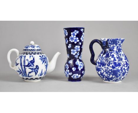 A Coalport Prunus Pattern Shaped Jug, Vine Stylised Handle together with a Coalport Prunus Pattern Vase and a Coalport Aesthe