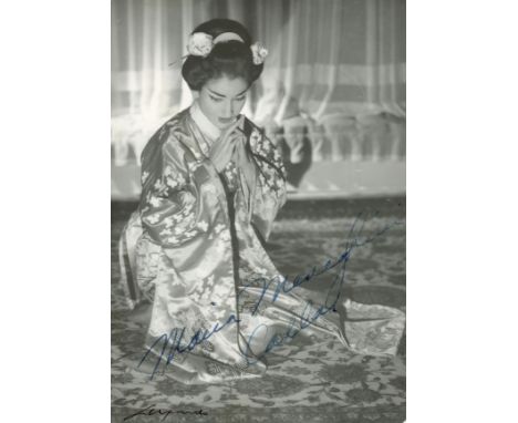 CALLAS MARIA: (1923-1977) American-born Greek Soprano. Vintage signed 4 x 6 photograph, depicting Callas kneeling, in a full 