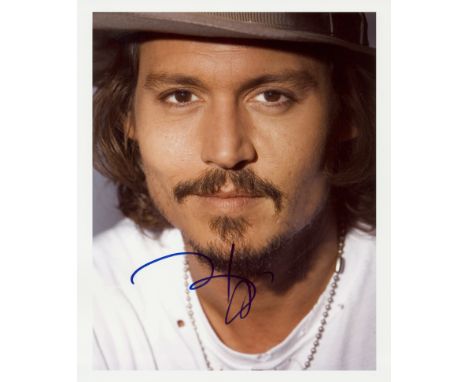 DEPP JOHNNY: (1963- ) American Actor. Signed colour 8 x 10 photograph showing the actor in close-up portrait pose. Boldly sig
