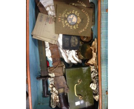 A leather suitcase containing various items of militaria, to include a WWII US Army bayonet by the Union Fork & Hoe Co., Colu