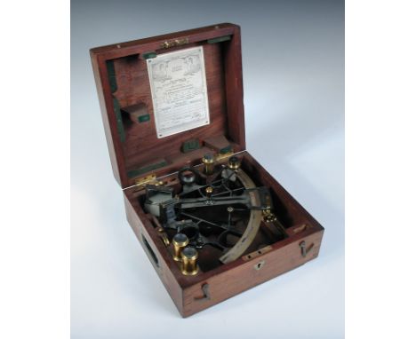 A cased Naval sextant of painted bronze and brass manufacture, by Elliott Brothers of London, complete with index mirror, fil