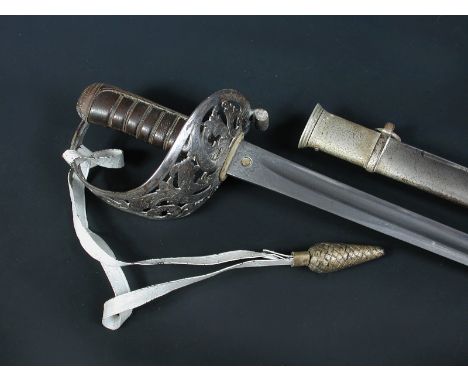 A Victorian cavalry officers sword by Henry Wilkinson, the pierced acanthus scroll hilt and leather grip, proof disc to one s