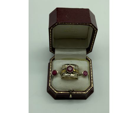 Sterling silver ring&nbsp; hallmarked 925 with Raw Ruby gemstone in the center approx 1ct with matching Raw Ruby studs