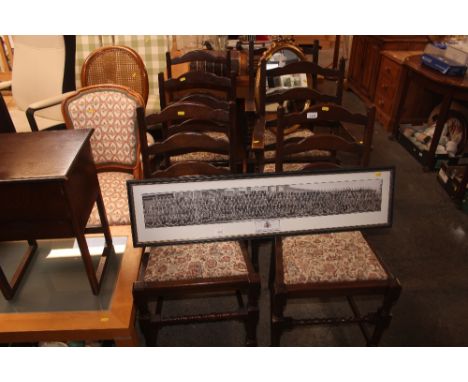 A set of oak ladder back dining chairs to include two carvers