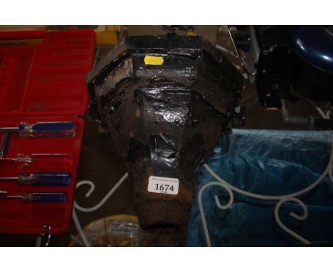 A cast metal rain hopper 