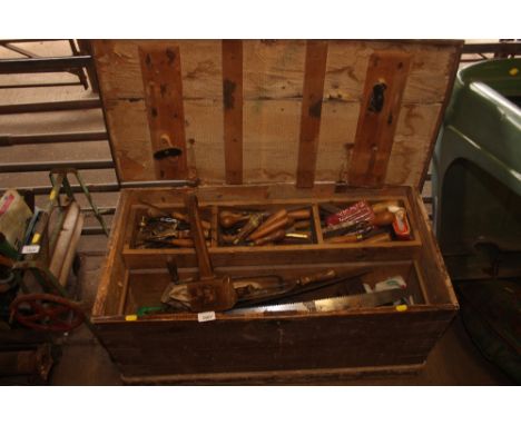 A carpenters tool chest and contents