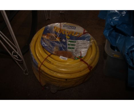 A roll of hose pipe 