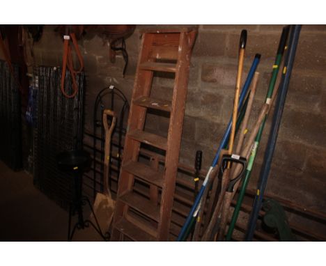 A wooden step ladder 