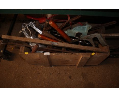 A wooden crate and contents of various hand tools 