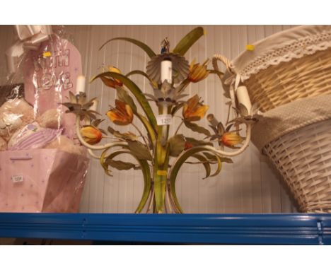 A six branch light fitting with floral decoration