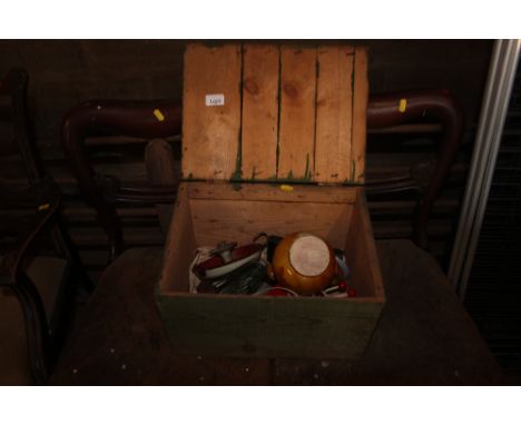 A pine box and contents of a retro style lamp; an enameled chamber stick etc.