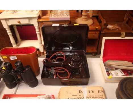 A vintage Ormond bakelite hairdryer in fitted bakelite case