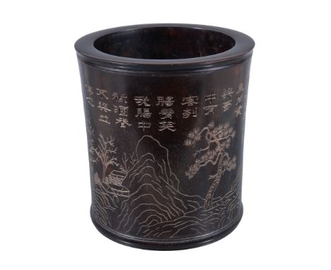  A Chinese incised hardwood brush pot  ,  bitong,   possibly Zitan wood, incised with a continuous landscape and with calligr