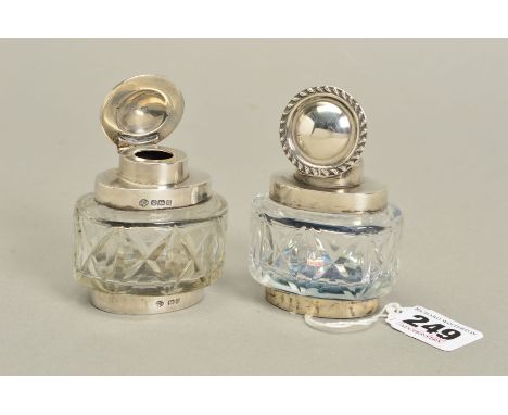 A PAIR OF GEORGE V SILVER MOUNTED OVAL CUT GLASS INKWELLS, makers William Hutton &amp; Sons Ltd, Sheffield 1912 (2)