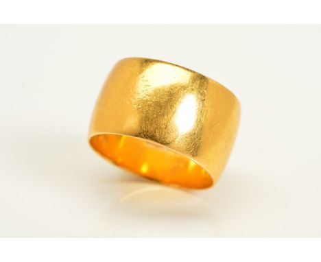 A 22CT GOLD RING, a plain polished band, with a 22ct hallmark for Birmingham, ring size O, approximate weight 12.6 grams