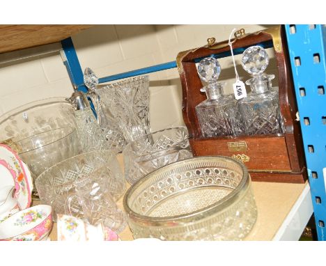 A 1989 OAK TANTALUS with a pair of square cut glass Royal Doulton decanters, (key), a Royal Doulton cut glass cream jug, unma